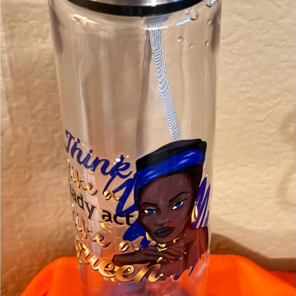 Stylish Clear Water Bottle with Blue and Gold Accents